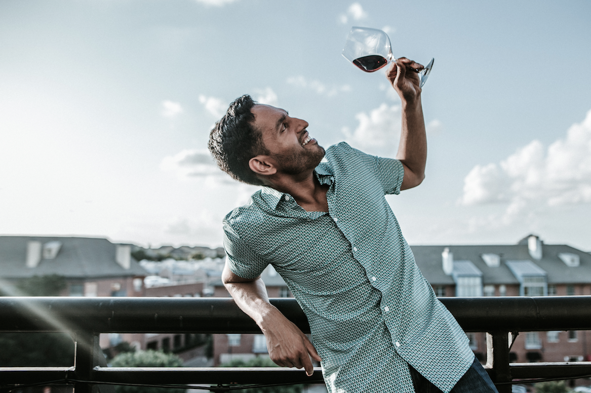 Man holding glass of wine